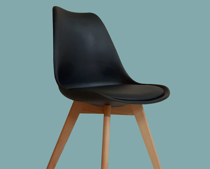 Black chair on blue background